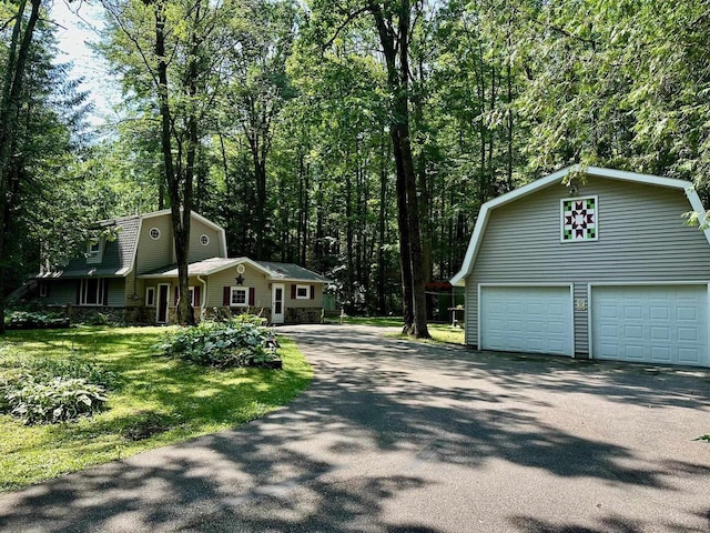 view of side of home with a yard