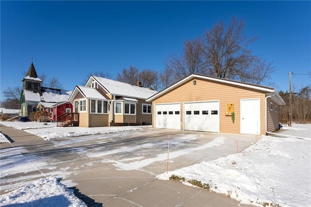 ranch-style home featuring a garage