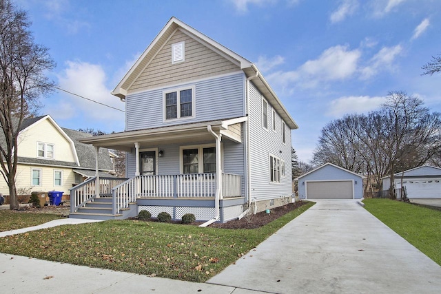 view of front facade with a porch, a garage, a front lawn, and an outdoor structure