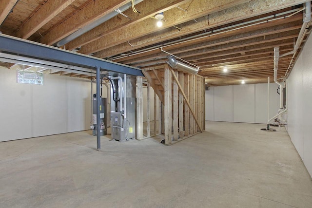 basement with heating unit and water heater