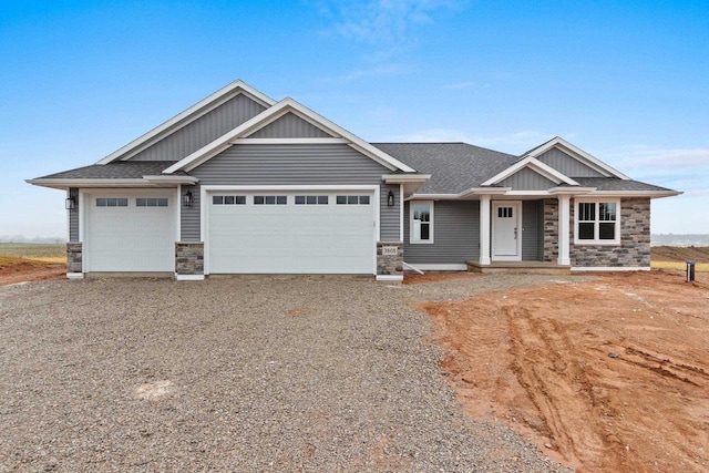 craftsman-style home with a garage