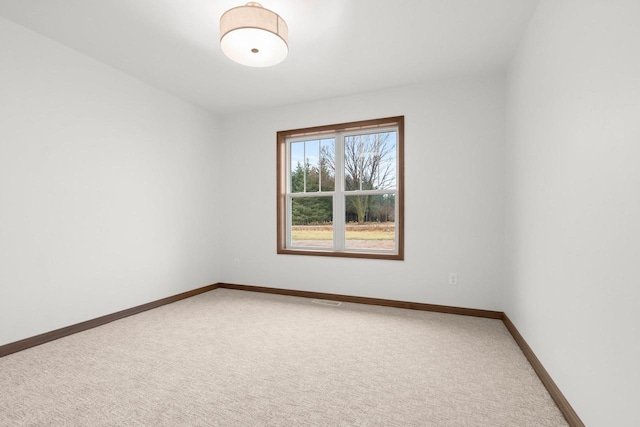 unfurnished room with carpet