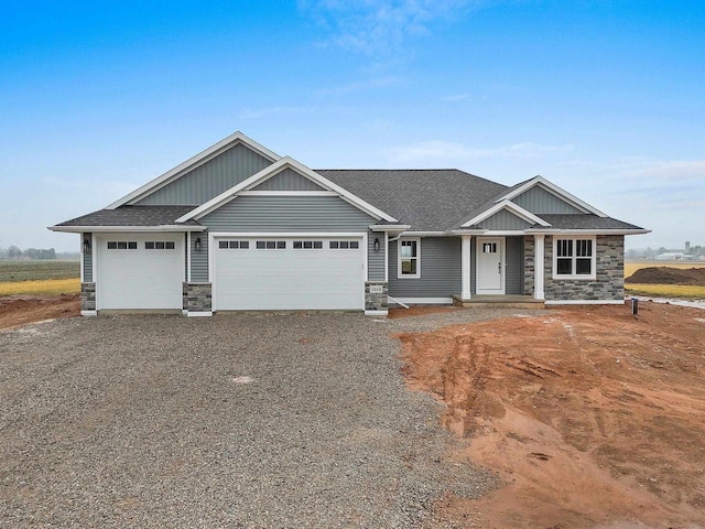 craftsman house featuring a garage