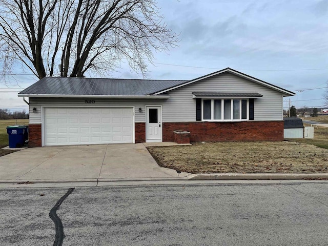 ranch-style home featuring a garage