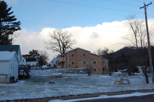 view of snow covered house