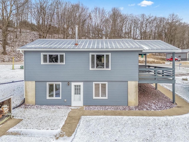 view of front of property with a wooden deck