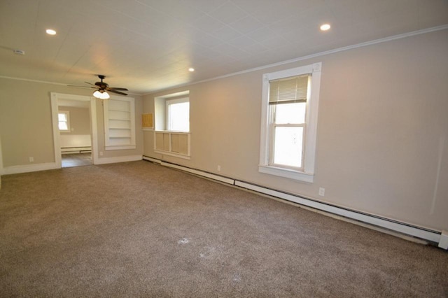 empty room with carpet, ceiling fan, crown molding, and a baseboard radiator