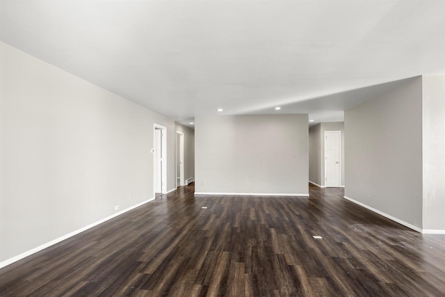 1001 Bay Shore Dr, Oshkosh, WI 54901 - spare room with dark wood-type flooring