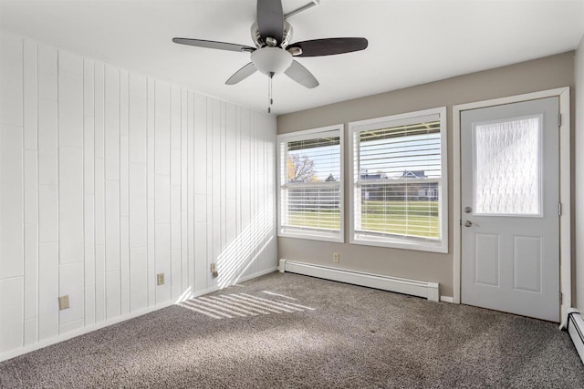 1001 Bay Shore Dr, Oshkosh, WI 54901 - carpeted foyer entrance featuring ceiling fan and a baseboard heating unit