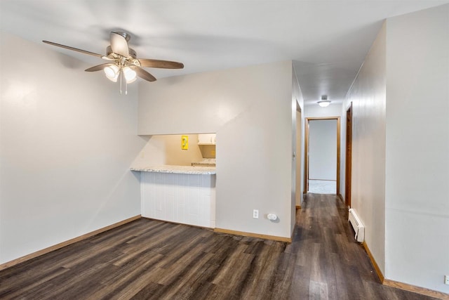 1001 Bay Shore Dr, Oshkosh, WI 54901 - interior space featuring baseboard heating, ceiling fan, and dark hardwood / wood-style floors
