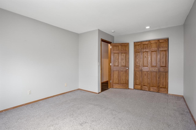 1001 Bay Shore Dr, Oshkosh, WI 54901 - unfurnished bedroom with carpet flooring and a closet