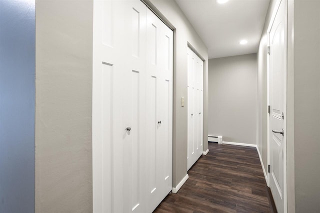 1001 Bay Shore Dr, Oshkosh, WI 54901 - hallway featuring dark hardwood / wood-style floors and a baseboard heating unit