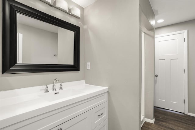 1001 Bay Shore Dr, Oshkosh, WI 54901 - bathroom with hardwood / wood-style floors and vanity
