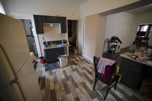 kitchen featuring hardwood / wood-style floors and sink