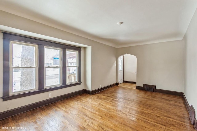 unfurnished room featuring wood-type flooring