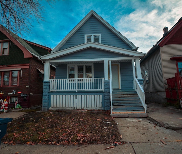 bungalow-style home with a porch