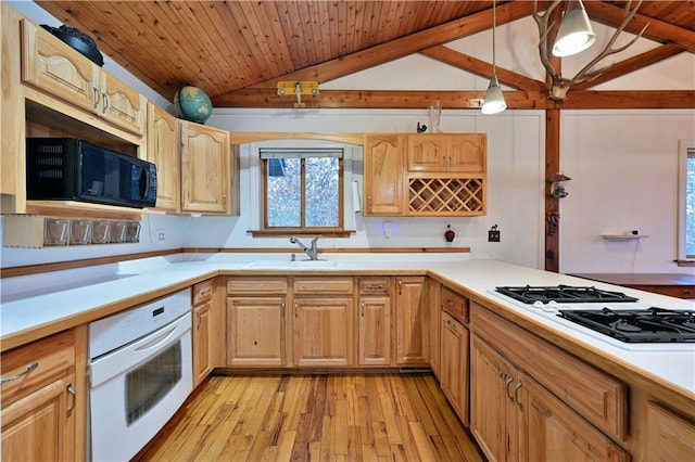 kitchen featuring white appliances, lofted ceiling with beams, decorative light fixtures, light hardwood / wood-style flooring, and wooden ceiling