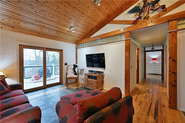 living room with wood-type flooring, lofted ceiling, and wood ceiling