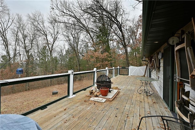 deck with an outdoor fire pit