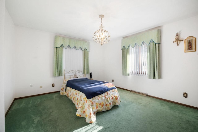 carpeted bedroom with an inviting chandelier