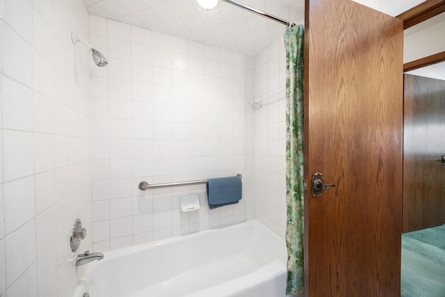 bathroom featuring shower / bathtub combination with curtain