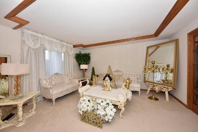 sitting room featuring carpet floors and crown molding