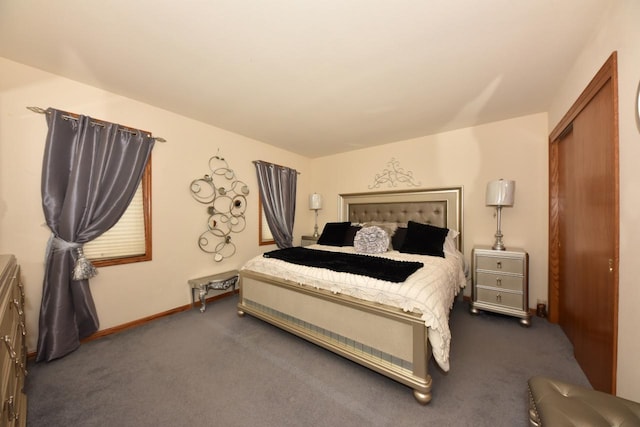 carpeted bedroom with a closet