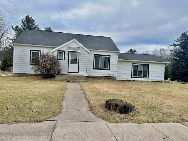 view of front of property with a front lawn