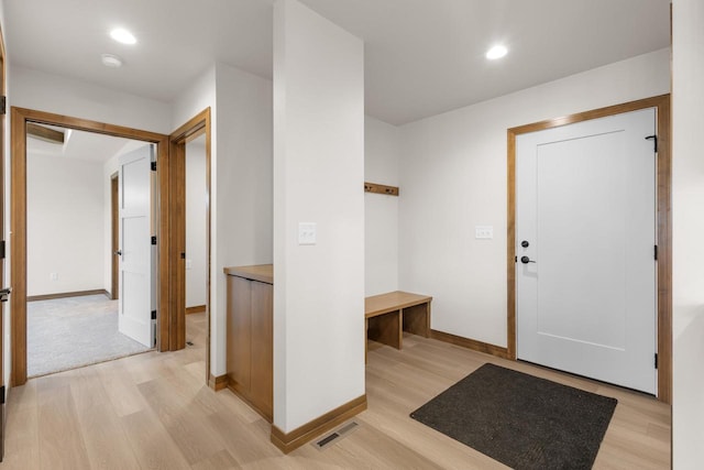 foyer entrance featuring light hardwood / wood-style flooring