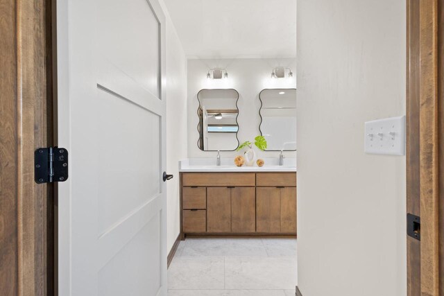 bathroom featuring tile patterned floors and vanity