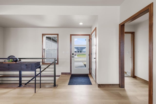 entryway with light wood-type flooring