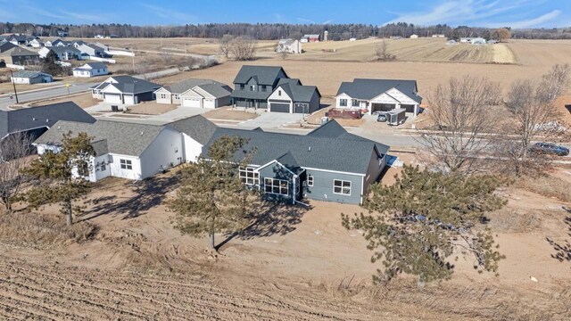 birds eye view of property featuring a rural view