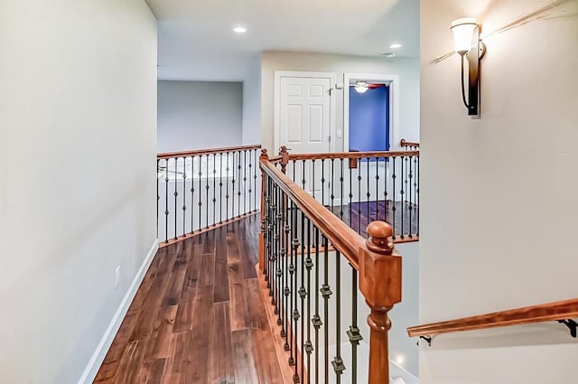 corridor featuring hardwood / wood-style floors