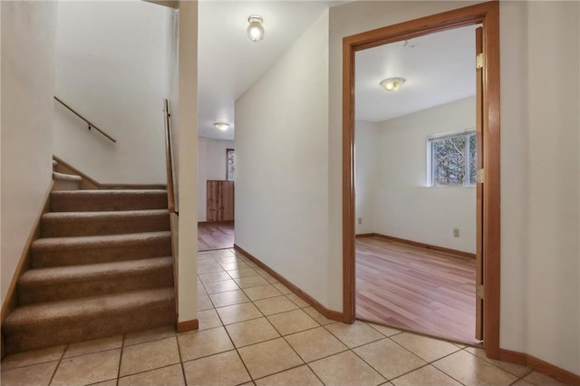 staircase featuring hardwood / wood-style floors