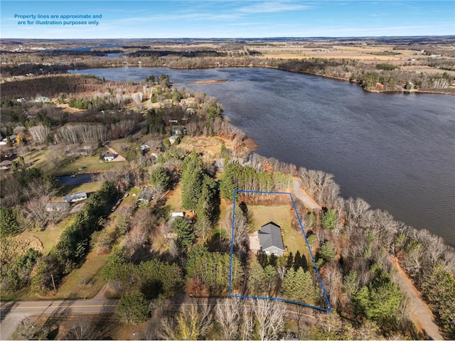 drone / aerial view featuring a water view