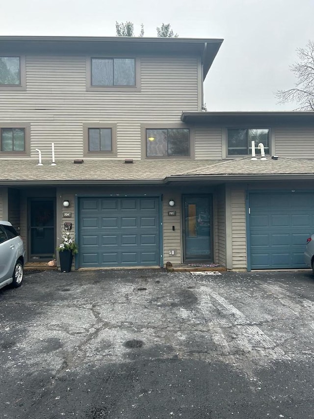 view of property with a garage