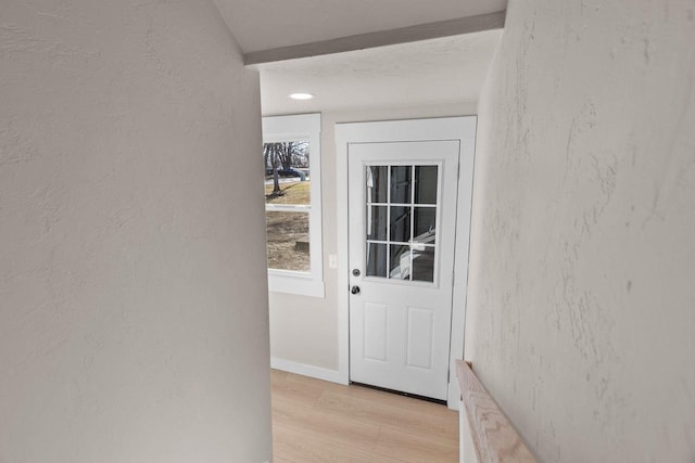 doorway featuring light hardwood / wood-style flooring