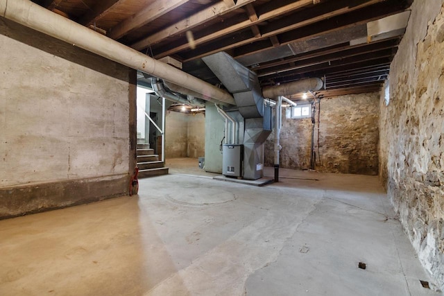 basement featuring heating unit