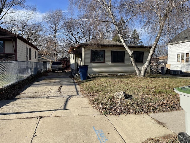 view of front of home with a front yard