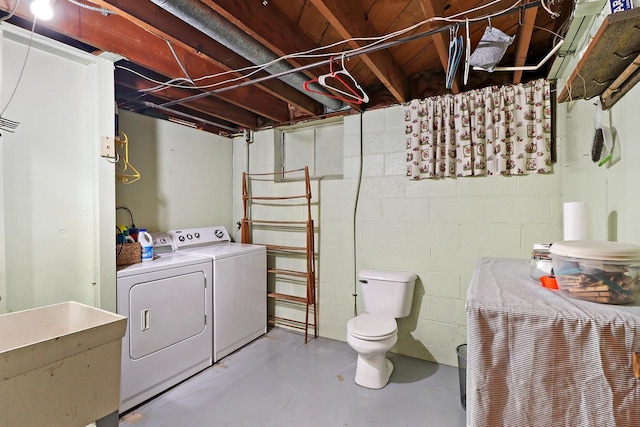 interior space featuring washer and clothes dryer and sink