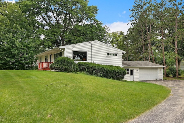 view of front of house featuring a front yard and covered porch