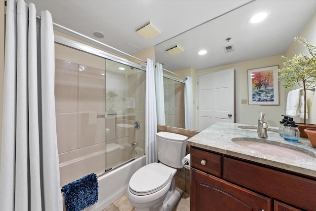 bathroom featuring visible vents, toilet, enclosed tub / shower combo, vanity, and recessed lighting