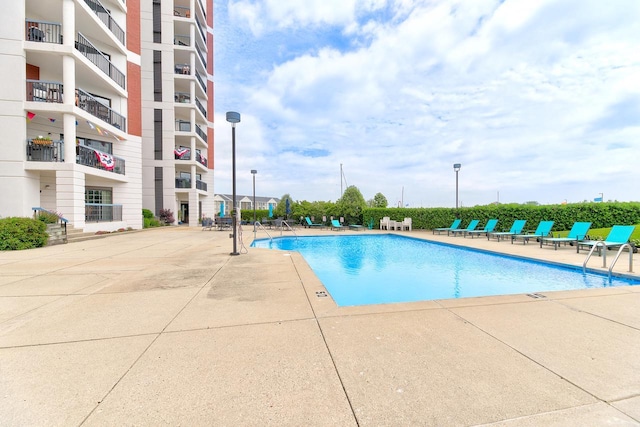 pool with a patio