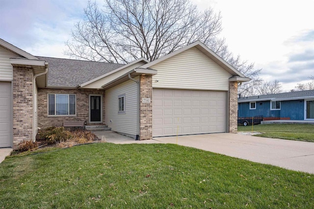 single story home with a front yard and a garage