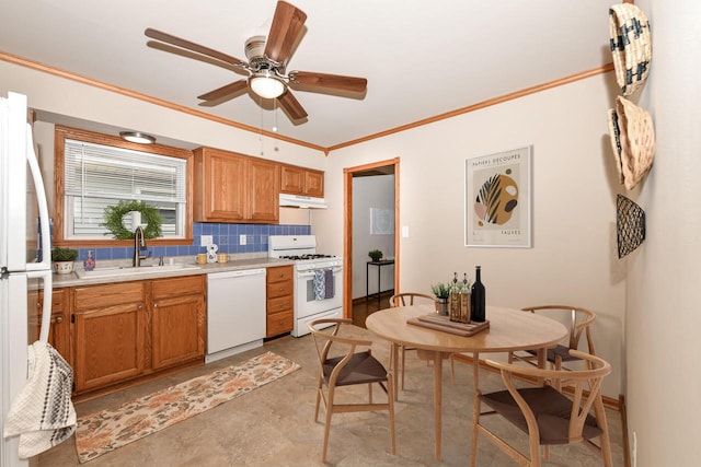 kitchen with ceiling fan, sink, backsplash, white appliances, and ornamental molding