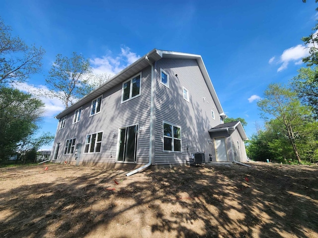 236 Russell Ct, Jefferson, WI 53549 - rear view of property with central AC