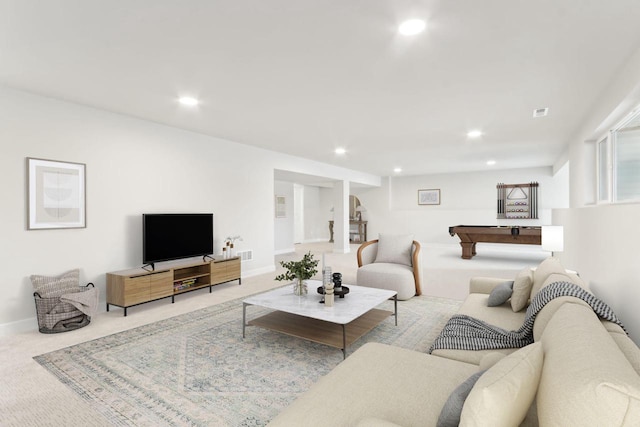 living area with light carpet, visible vents, baseboards, and recessed lighting