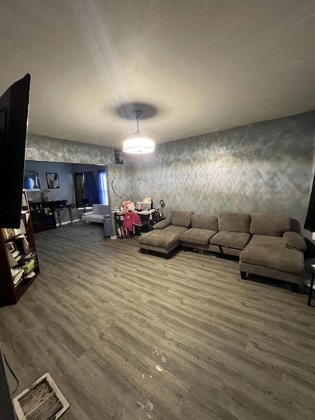 living room with dark hardwood / wood-style floors