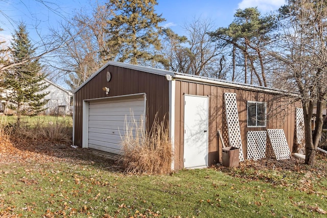 garage with a lawn