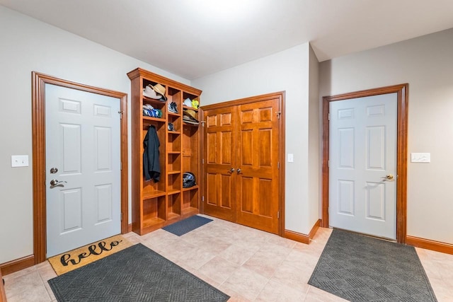 mudroom featuring light tile patterned floors